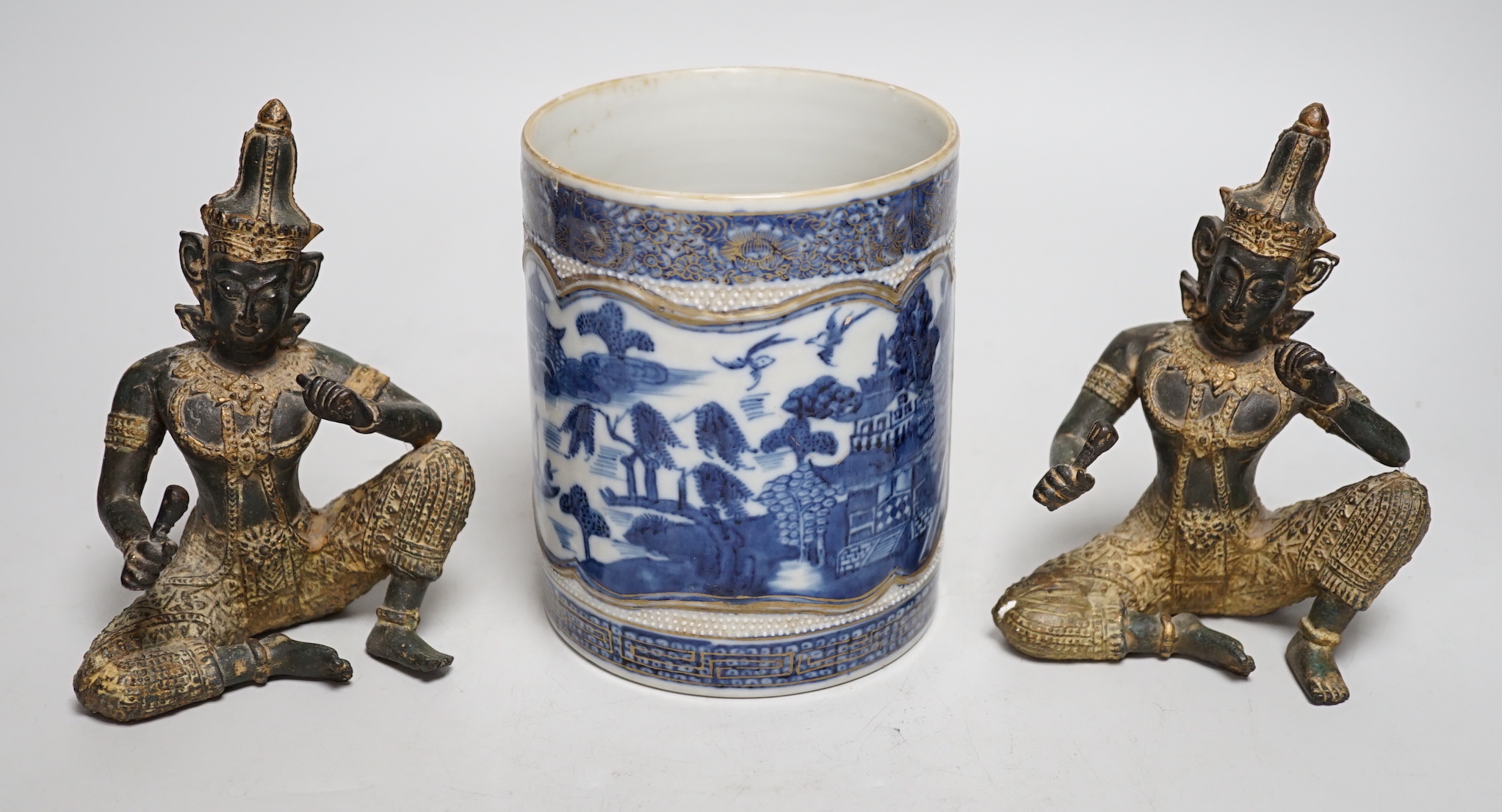 An 18th century Chinese export blue and white mug and two Thai bronze figures, mug 13cm tall